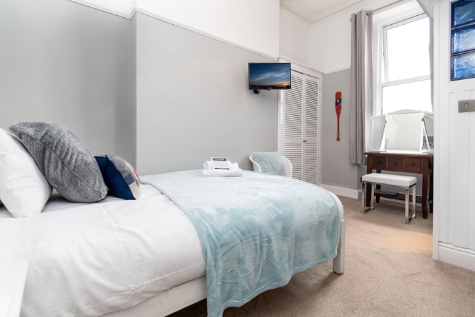 Imagen de la habitación del Hotel Beachside Guest House. Foto 15
