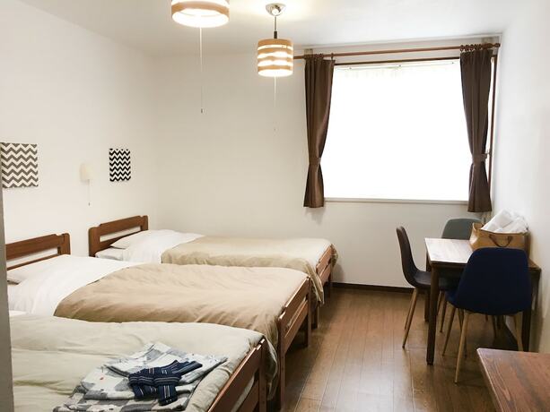 Imagen de la habitación del Hotel Beachside Inn Shirahama. Foto 17