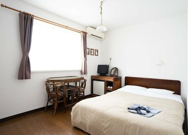 Imagen de la habitación del Hotel Beachside Inn Shirahama. Foto 19