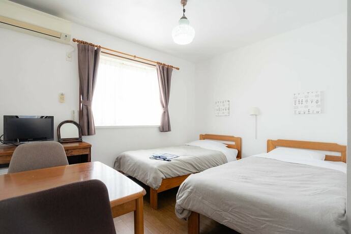 Imagen de la habitación del Hotel Beachside Inn Shirahama. Foto 20