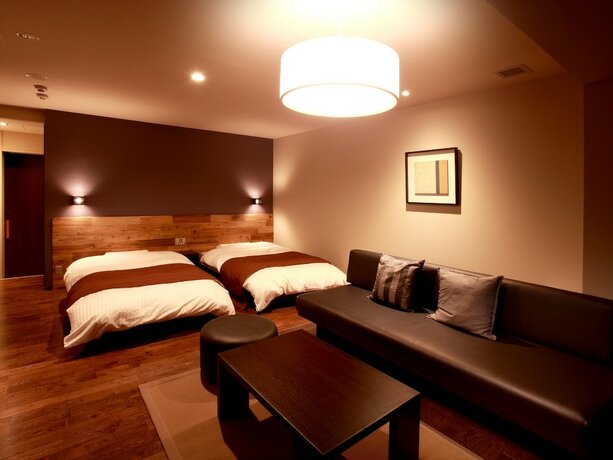 Imagen de la habitación del Hotel Beachside Onsen Resort Umi. Foto 13