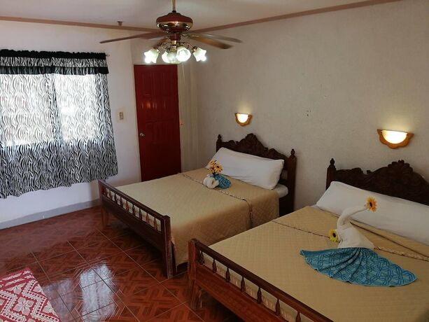 Imagen de la habitación del Hotel Beachview Pink Lodge. Foto 19