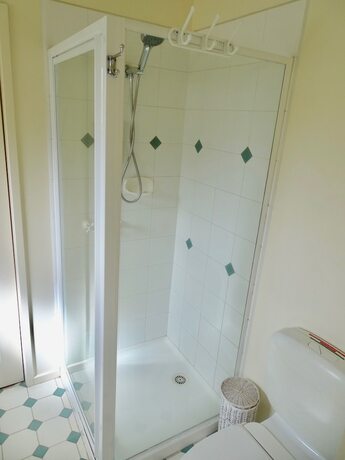 Imagen de la habitación del Hotel Beachwalk Cottage. Foto 31