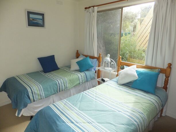 Imagen de la habitación del Hotel Beachwalk Cottage. Foto 32