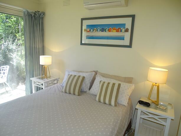 Imagen de la habitación del Hotel Beachwalk Cottage. Foto 35