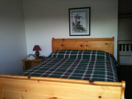 Imagen de la habitación del Hotel Bear's Claw Lodge. Foto 14
