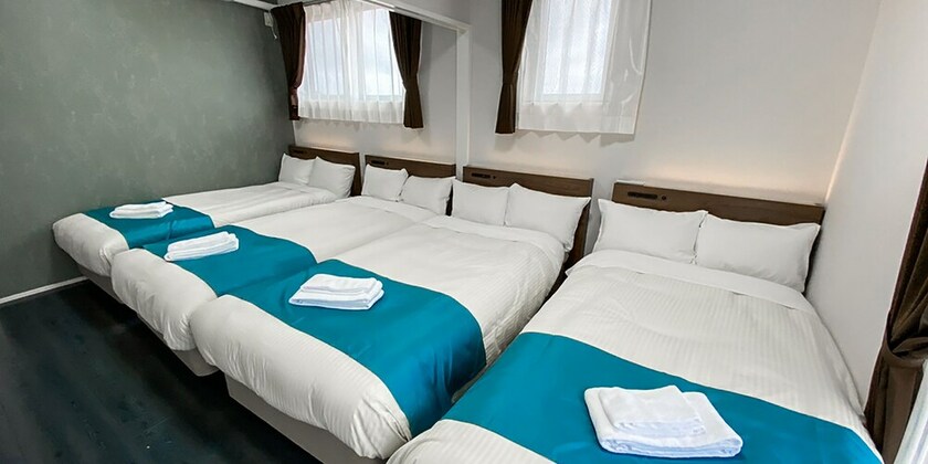 Imagen de la habitación del Hotel Bears Stay Kumejima Ifu Beach. Foto 18