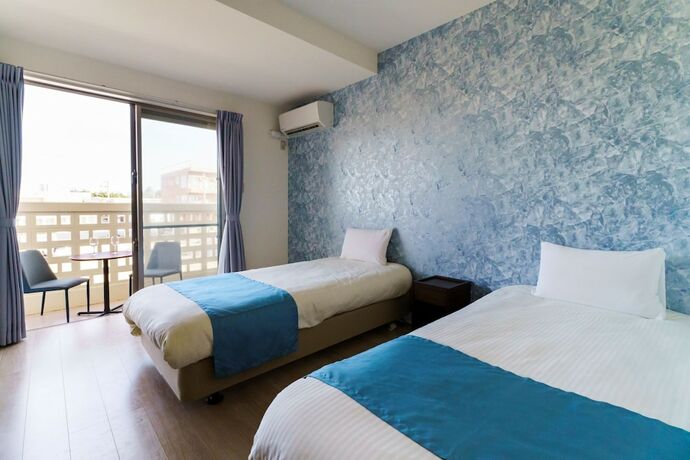 Imagen de la habitación del Hotel Bears Stay Kumejima Ifu Beach. Foto 19