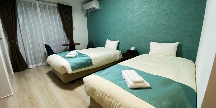 Imagen de la habitación del Hotel Bears Stay Kumejima Ifu Beach. Foto 29