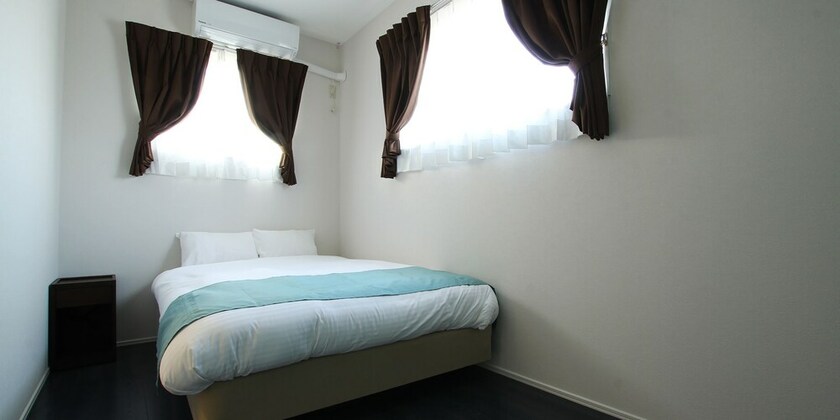 Imagen de la habitación del Hotel Bears Stay Kumejima Ifu Beach. Foto 30
