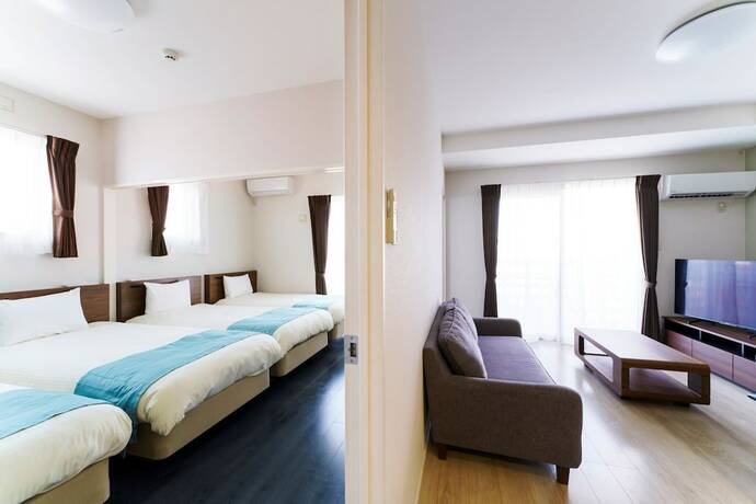 Imagen de la habitación del Hotel Bears Stay Kumejima Ifu Beach. Foto 32
