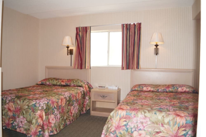 Imagen de la habitación del Hotel Beau Rivage Beach Resort. Foto 8