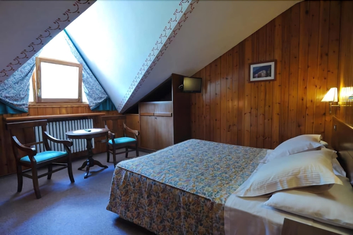 Imagen de la habitación del Hotel Beau Sejour. Foto 13