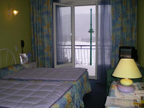 Imagen de la habitación del Hotel Beau Site, Chambon-sur-Lac. Foto 7