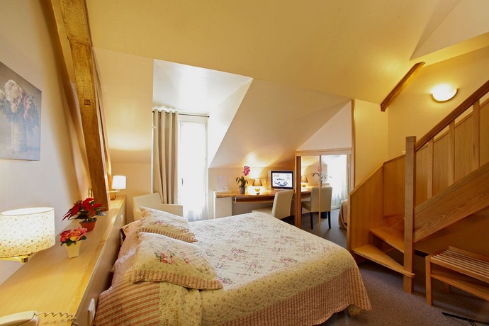 Imagen de la habitación del Hotel Beau Site Notre Dame. Foto 3