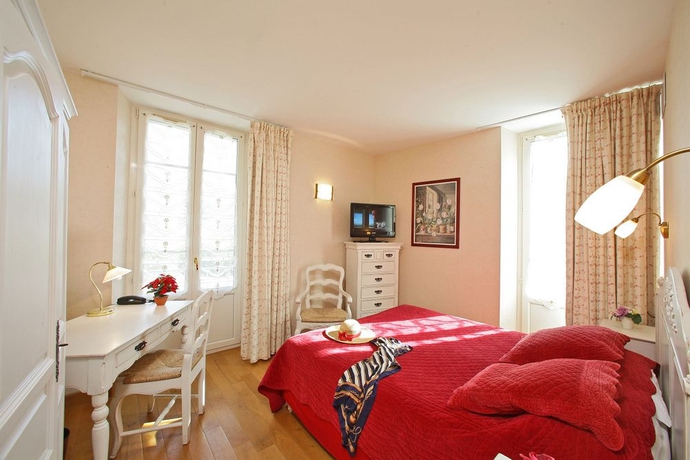 Imagen de la habitación del Hotel Beau Site Notre Dame. Foto 4