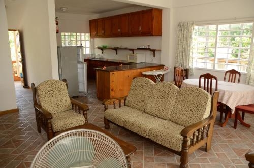 Imagen de la habitación del Hotel Beau Vallon Villa Apartments. Foto 7