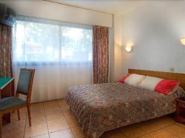 Imagen de la habitación del Hotel Beauquartier Montmartre. Foto 8