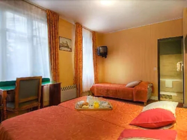 Imagen de la habitación del Hotel Beauquartier Montmartre. Foto 16