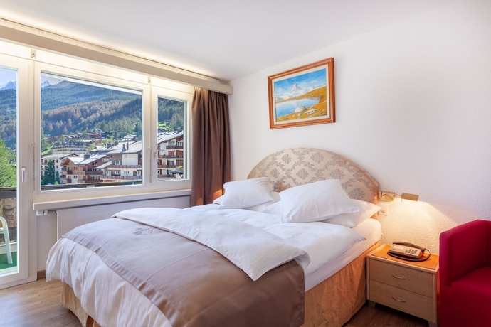 Imagen de la habitación del Hotel Beau-rivage. Foto 12