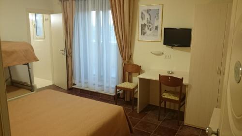 Imagen de la habitación del Hotel Beaurivage, Fano. Foto 9