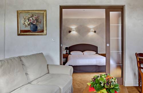 Imagen de la habitación del Hotel Beauséjour, Vic-sur-Cere. Foto 5