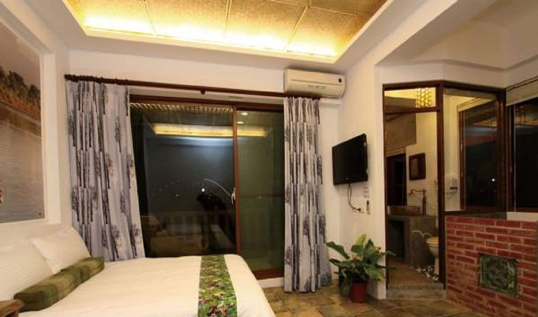 Imagen de la habitación del Hotel Beautiful Ilan Resort. Foto 16