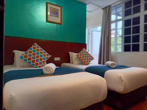 Imagen de la habitación del Hotel Beautiful Marigold. Foto 15