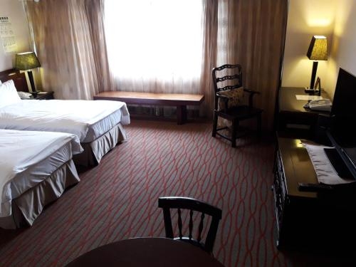 Imagen de la habitación del Hotel Beautiful Taipei. Foto 6