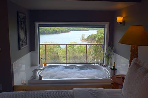 Imagen de la habitación del Hotel Beaver Lakefront Cabins - Couples Only Getaways. Foto 6