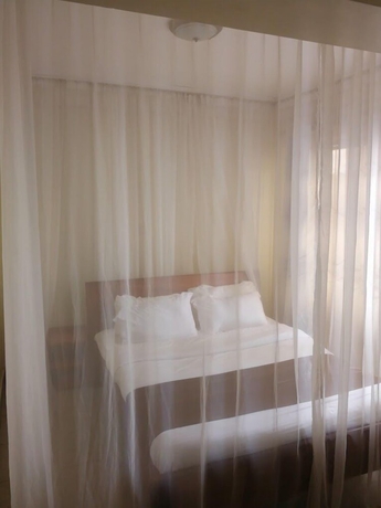 Imagen de la habitación del Hotel Becca Meru. Foto 9
