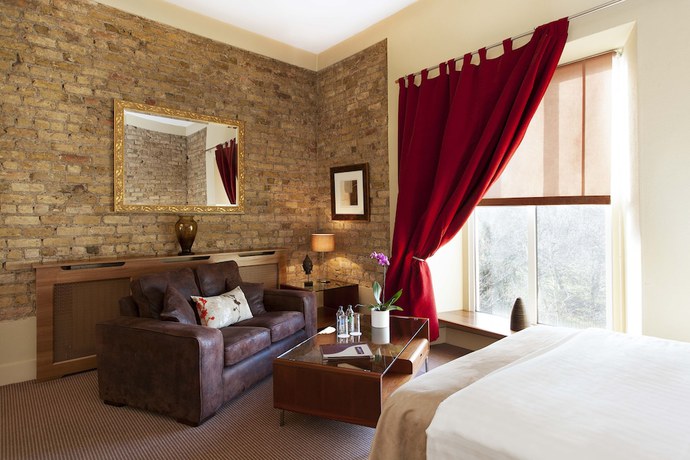 Imagen de la habitación del Hotel Becketts. Foto 10