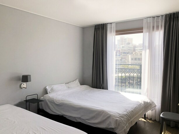Imagen de la habitación del Hotel Bed Radio Dongmoon - Hostel. Foto 34