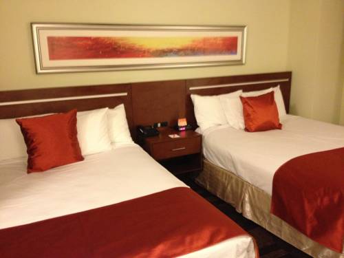 Imagen de la habitación del Hotel Bedfort Inn and Suites. Foto 11
