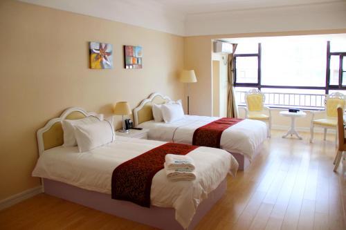 Imagen general del Hotel Bedom Apartments · Wanda Plaza, Qingdao. Foto 1