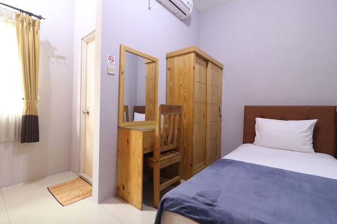 Imagen de la habitación del Hotel Bedur Homestay Syariah. Foto 9
