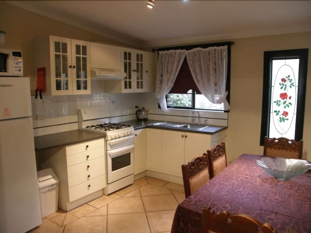 Imagen de la habitación del Hotel Beedelup House Cottages. Foto 6