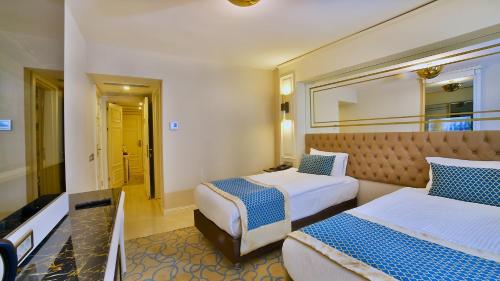 Imagen de la habitación del Hotel Beethoven Premium. Foto 10