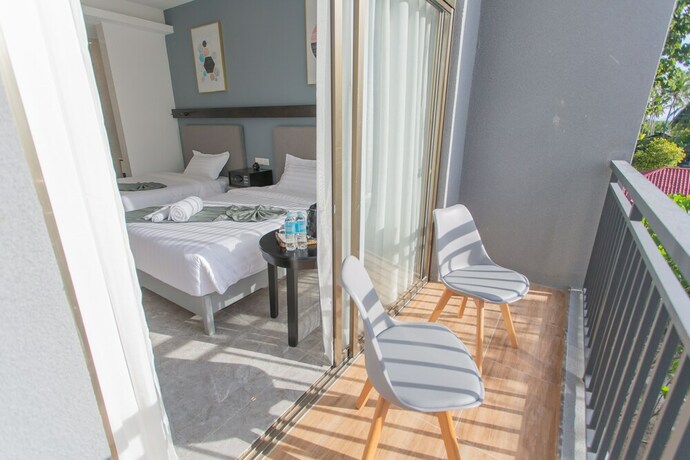 Imagen de la habitación del Hotel Begonia Resort. Foto 17