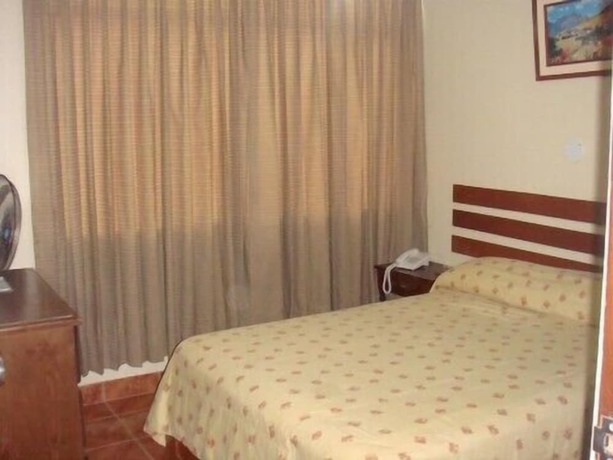Imagen de la habitación del Hotel Begonias - Chiclayo. Foto 11