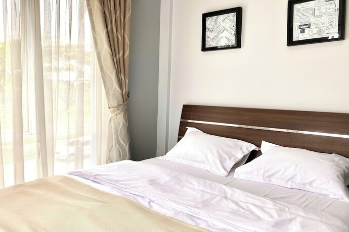 Imagen de la habitación del Hotel Behomy Corner 8 Lippo Karawaci. Foto 11