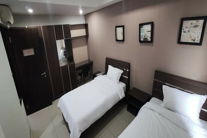 Imagen de la habitación del Hotel Behomy Corner 8 Lippo Karawaci. Foto 12