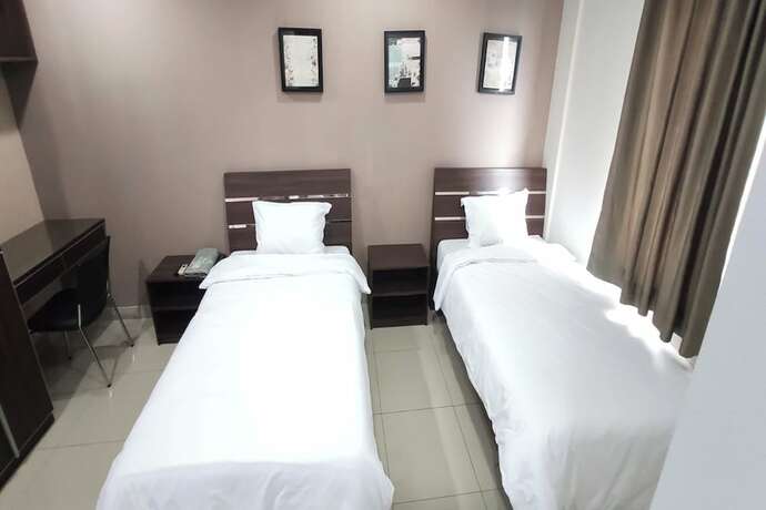 Imagen de la habitación del Hotel Behomy Corner 8 Lippo Karawaci. Foto 13