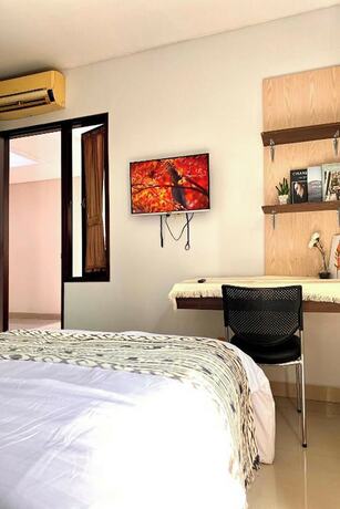 Imagen de la habitación del Hotel Behomy Corner 8 Lippo Karawaci. Foto 15