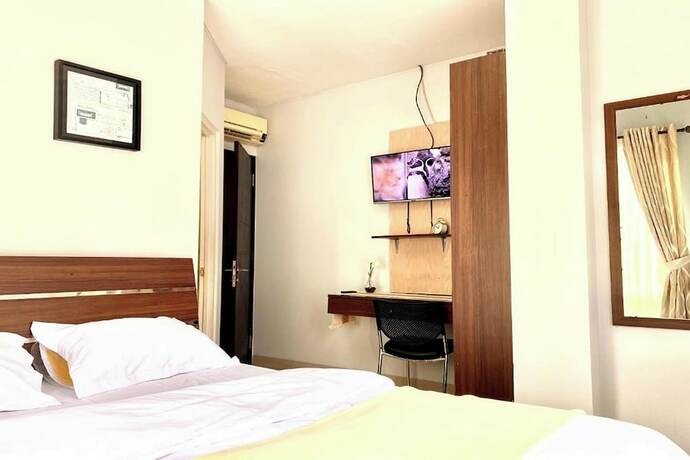 Imagen de la habitación del Hotel Behomy Corner 8 Lippo Karawaci. Foto 17