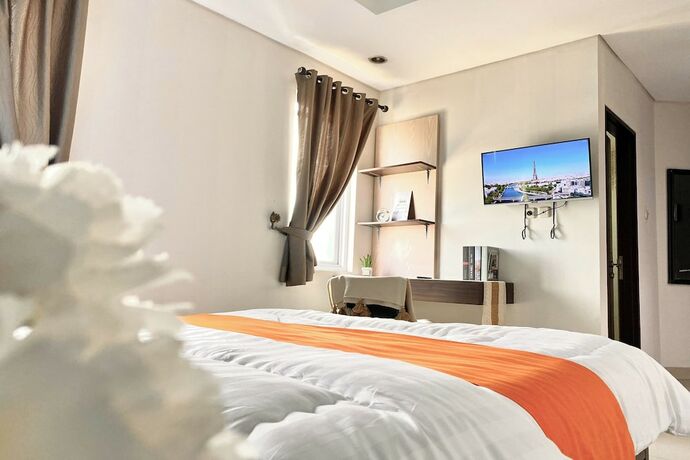 Imagen de la habitación del Hotel Behomy Corner 8 Lippo Karawaci. Foto 19