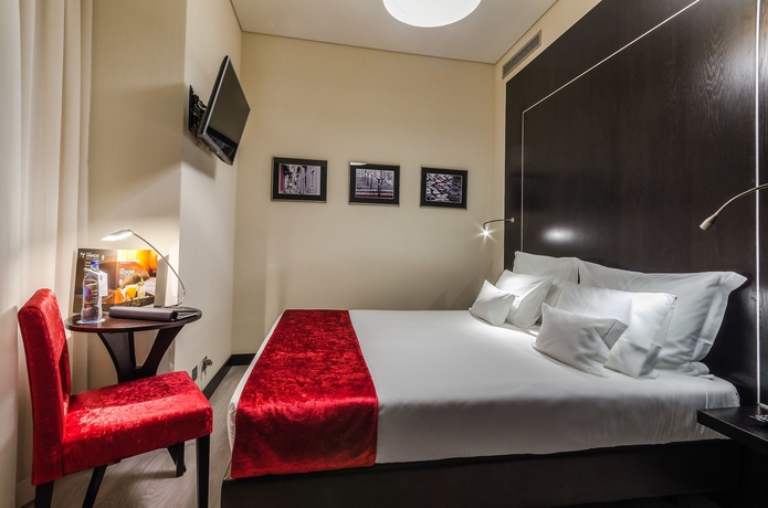 Imagen de la habitación del Hotel Behotelisboa. Foto 10