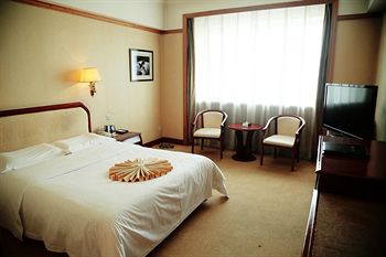 Imagen de la habitación del Hotel Beidahuang International. Foto 4