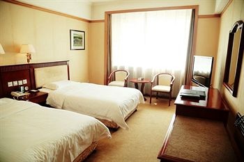 Imagen de la habitación del Hotel Beidahuang International. Foto 5