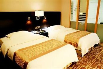 Imagen de la habitación del Hotel Beidahuang International. Foto 11